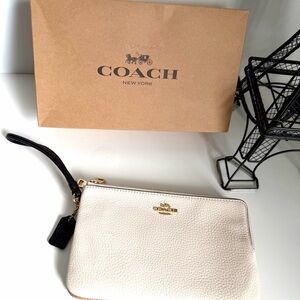Coach Cream Wristlet Clutch with Black Strap